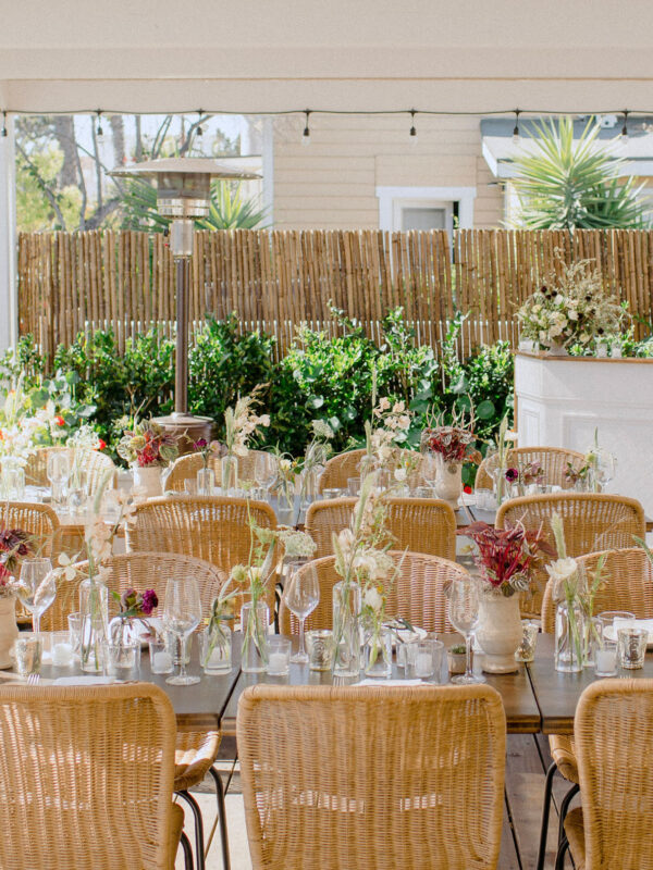Tables and bar set up on the patio for a private event