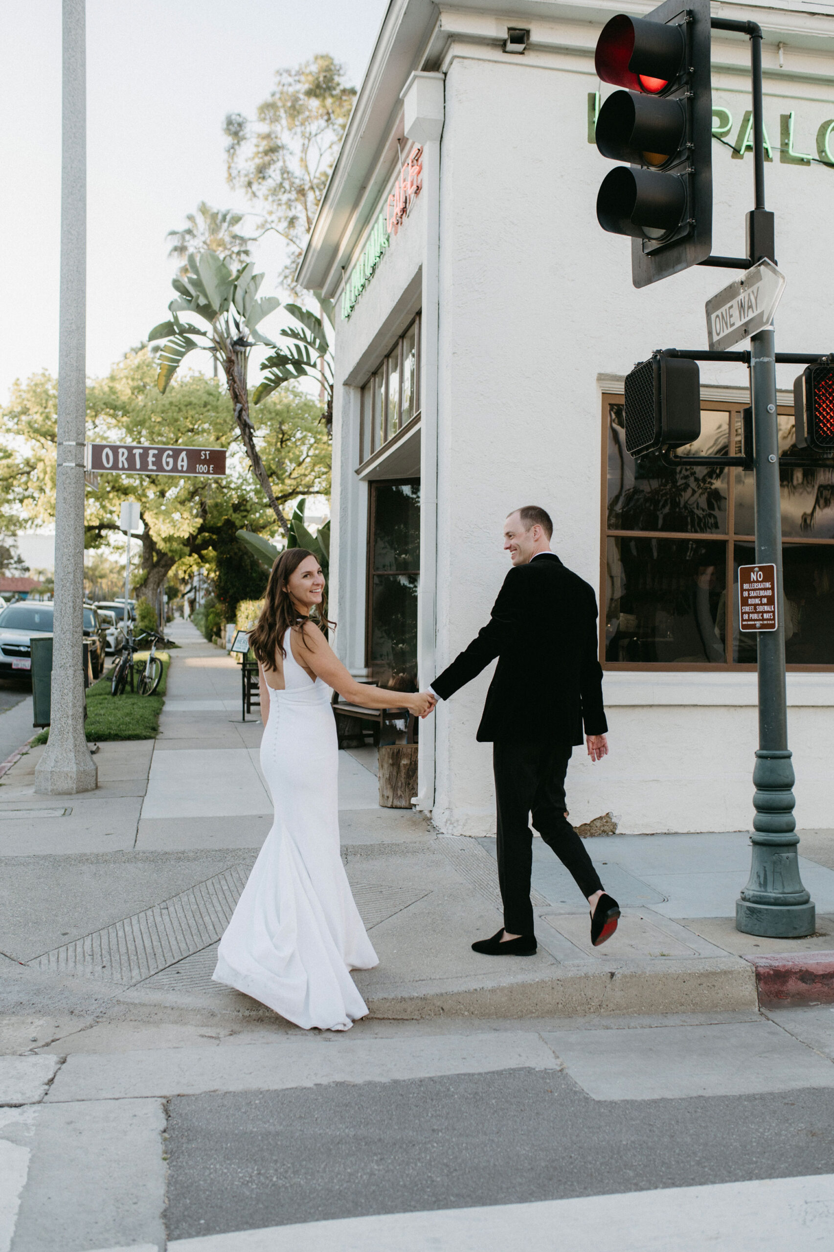 Wedding couple walking into Paloma